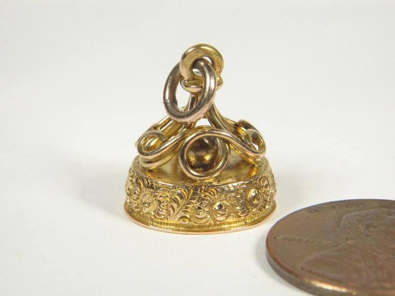 wonderful antique charm, wearable and very collectableideal for 