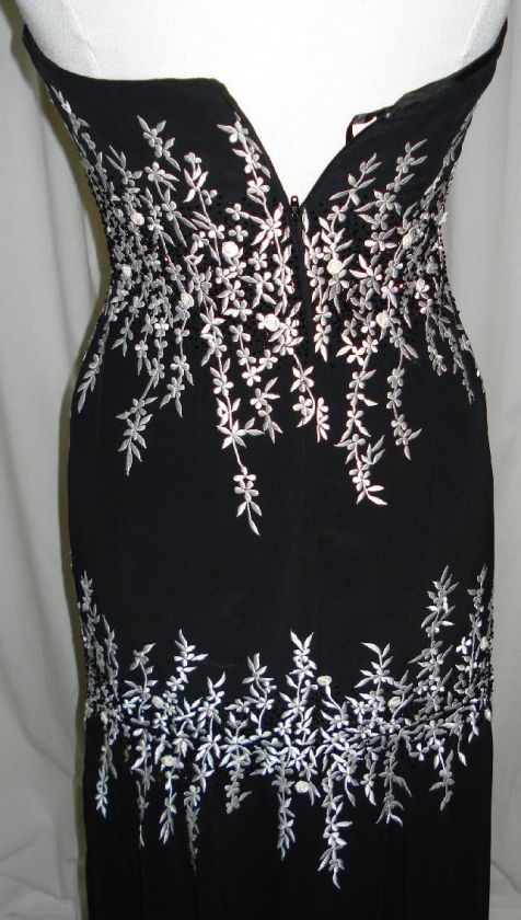 imagine yourself in this gorgeous evening gown the color is black with 