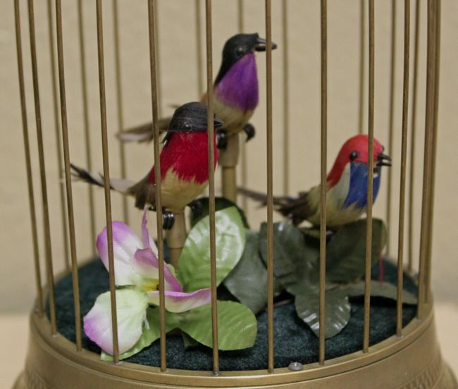 ANIMATED SINGING BIRD in a BRASS CAGE MUSIC BOX  